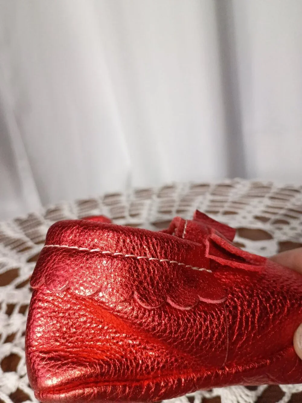 Freshly picked ruby red baby mocassins with bow and ruffles size 5